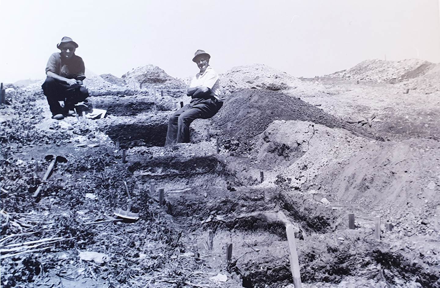 A group of people in a rocky area

Description automatically generated